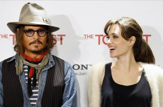 Johnny Deep y Angelina Jolie, en la presentación en Madrid de 'The Tourist', en diciembre de 2010.-DAVID CASTRO
