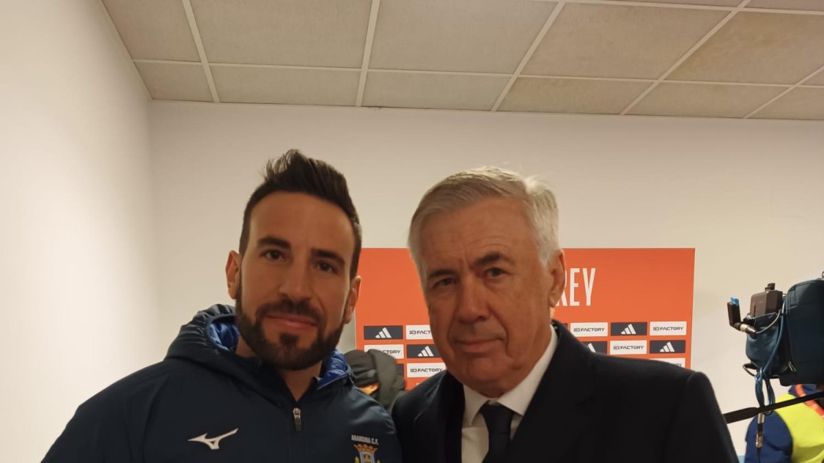 Alex posa con Ancelotti
