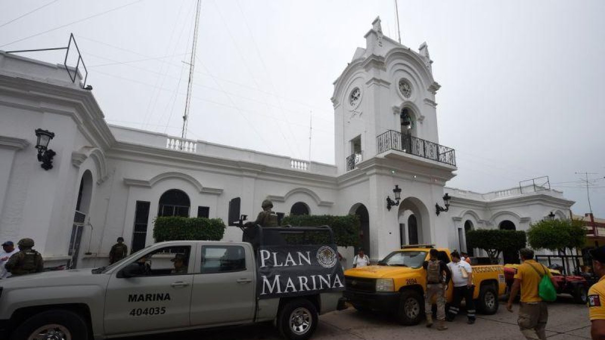 Como preparación del impacto de estos ciclones, el Gobierno de México activó el plan de emergencias para proteger a la población.-AFP
