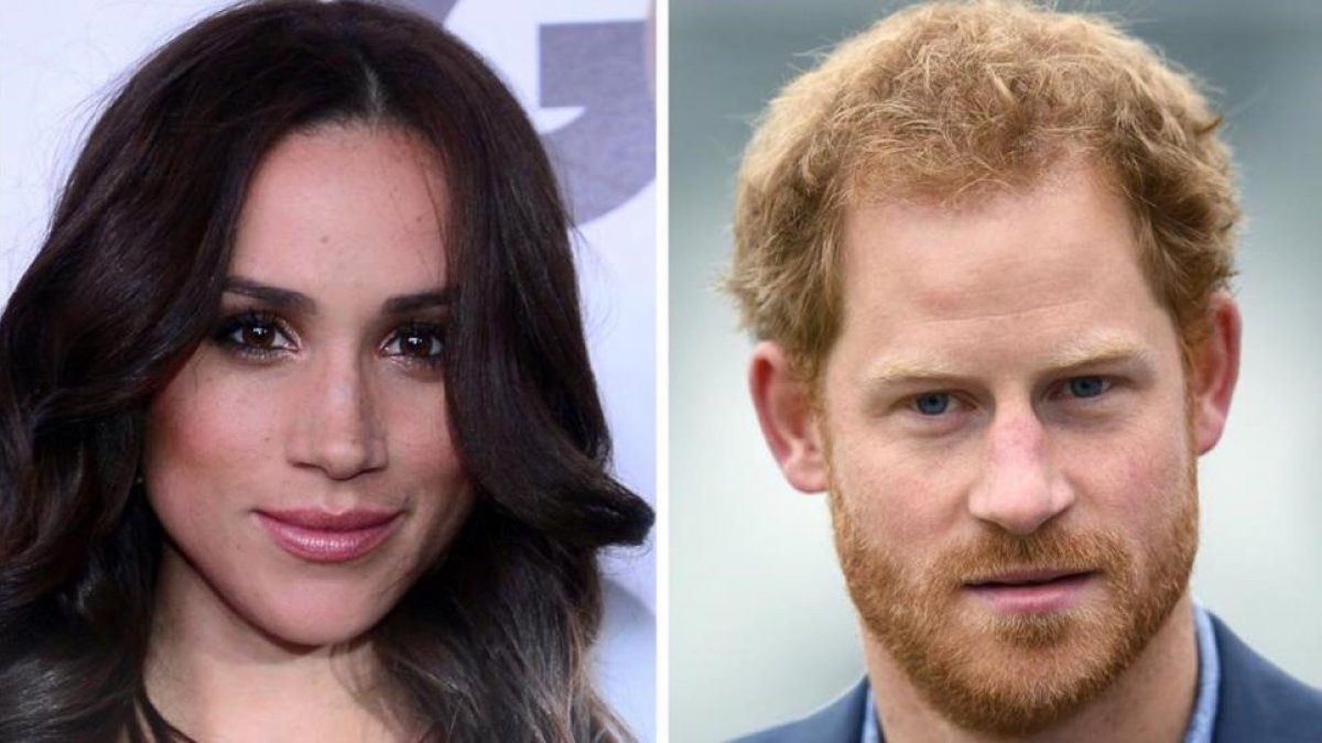 El príncipe Enrique y su novia, la actriz Meghan Markle.-AP / FREDERIC J BROWN