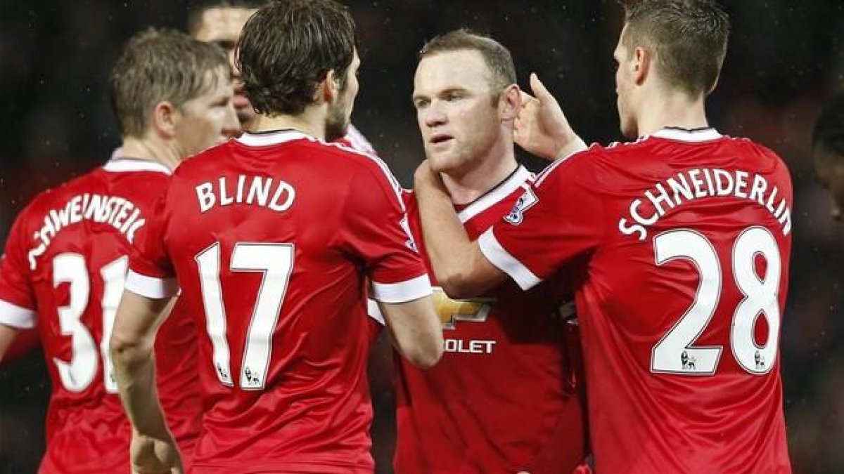 Rooney celebra el gol triunfo del Manchester United.-CARL RECINE / REUTERS