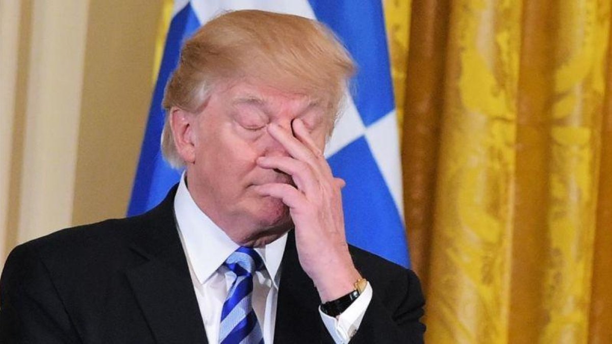 Trump, en un acto en la Casa Blanca, el 24 de marzo.-AFP / MANDEL NGAN