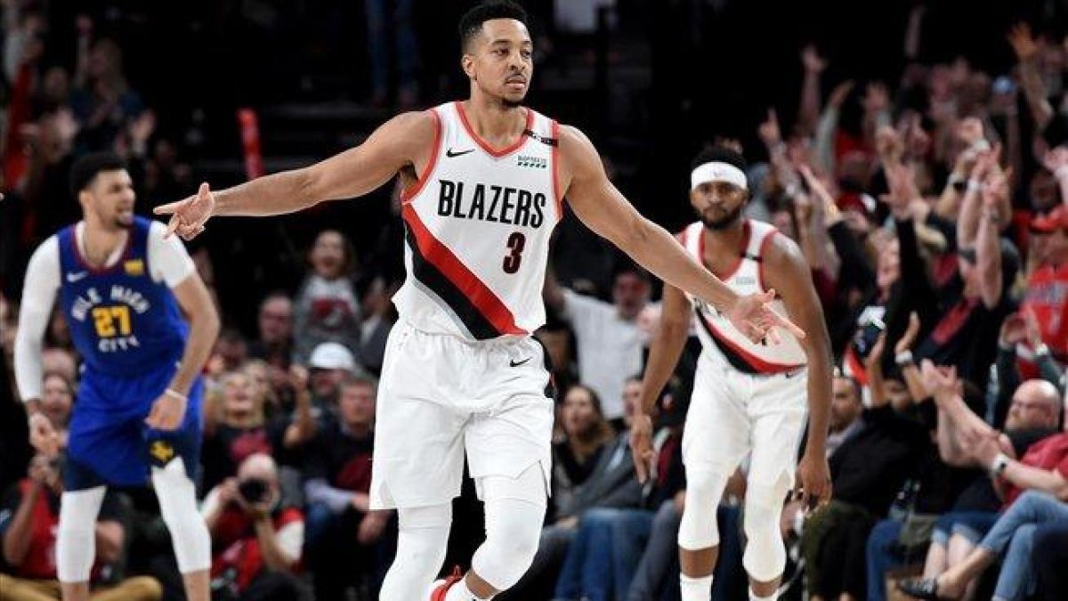 CJ McCollum celebra una de sus canastas en el partido de las cuatro prórrogas-STEVE DYKES (AFP)