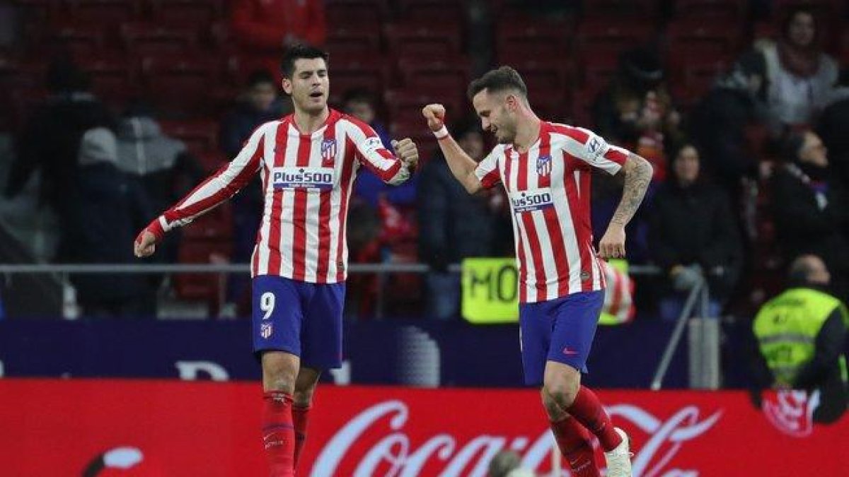 Saúl celebra con Morata el segundo gol del Atlético.-EFE
