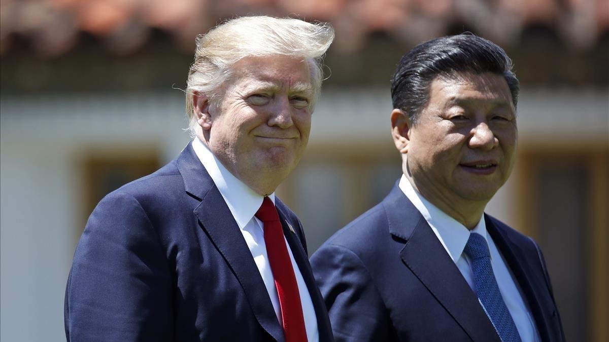 Trump y Xi Jinping.-AP / ALEX BRANDON