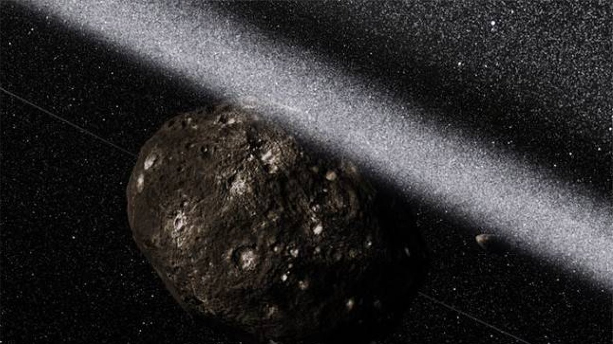 Una impresión artística de los anillos que rodean el asteroide Chariklo.-Foto: EFE