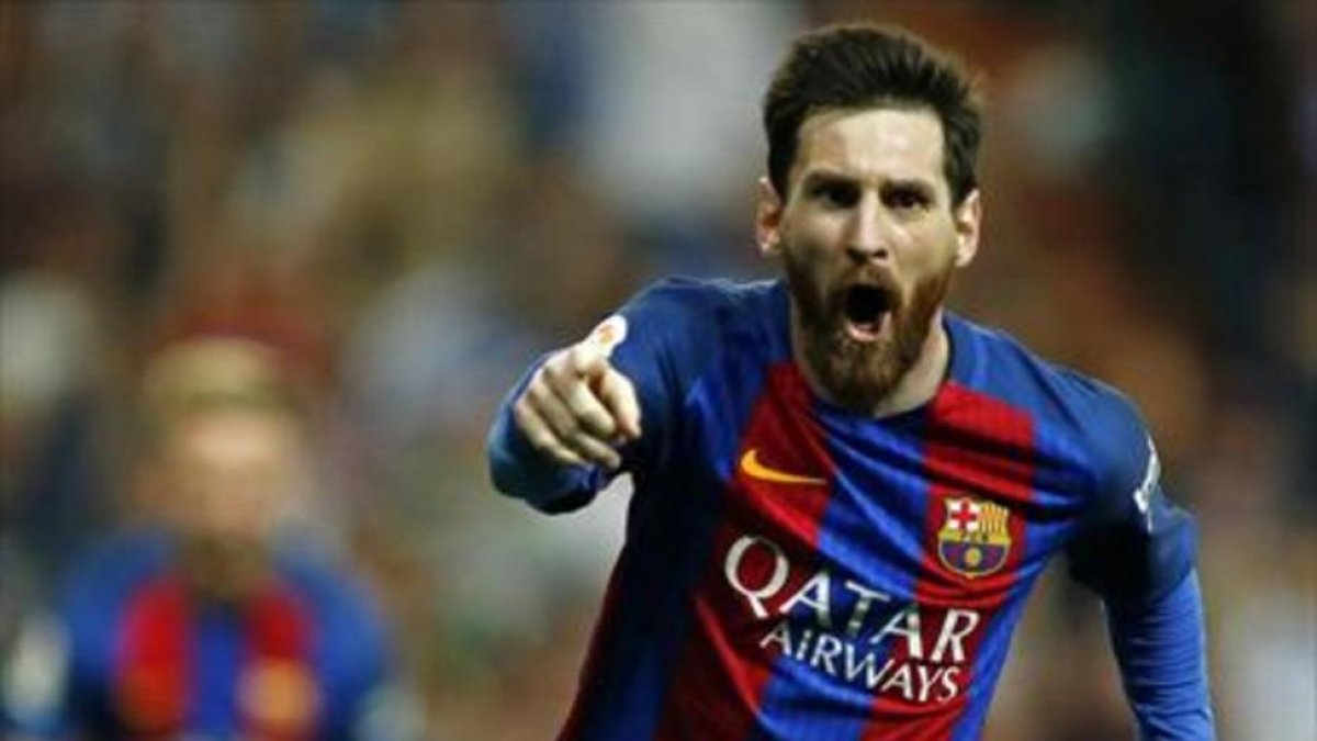 Messi celebra un gol al Madrid en el Bernabéu, esta temporada.-AFP
