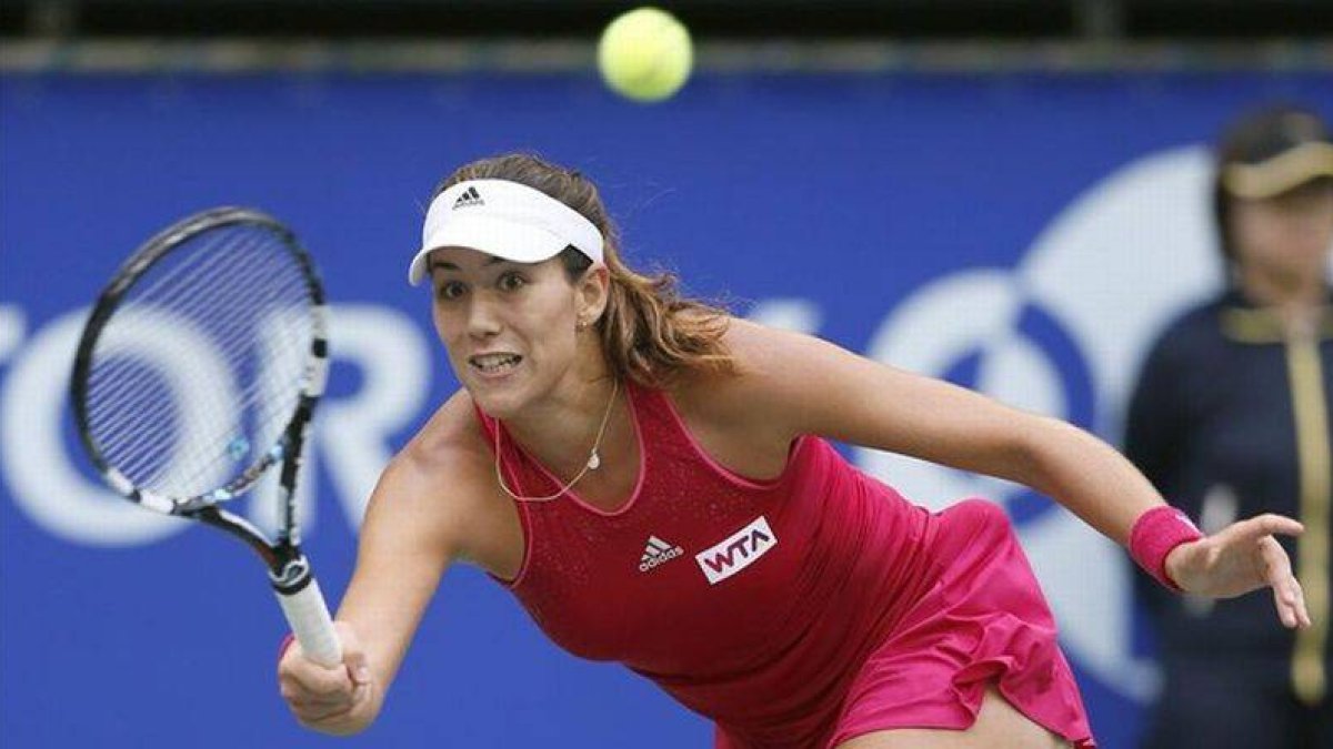 Garbiñe Muguruza, en acción.-Foto: EFE / KIMIMASA MAYAMA
