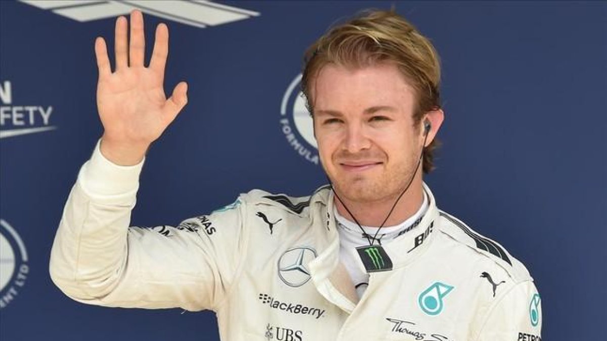 Rosberg celebra su 'pole' en Brasil.-AFP / NELSON ALMEIDA