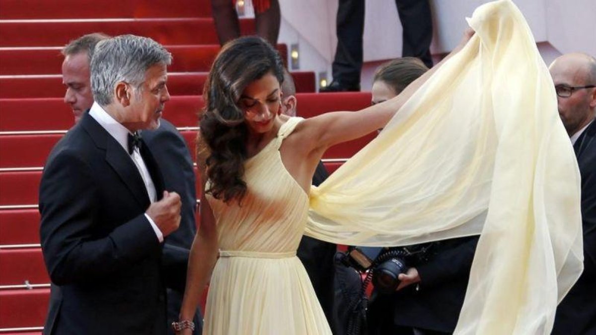 George Clooney y Amal, en el festival de Cannes.-REUTERS / ERIC GAILLARD