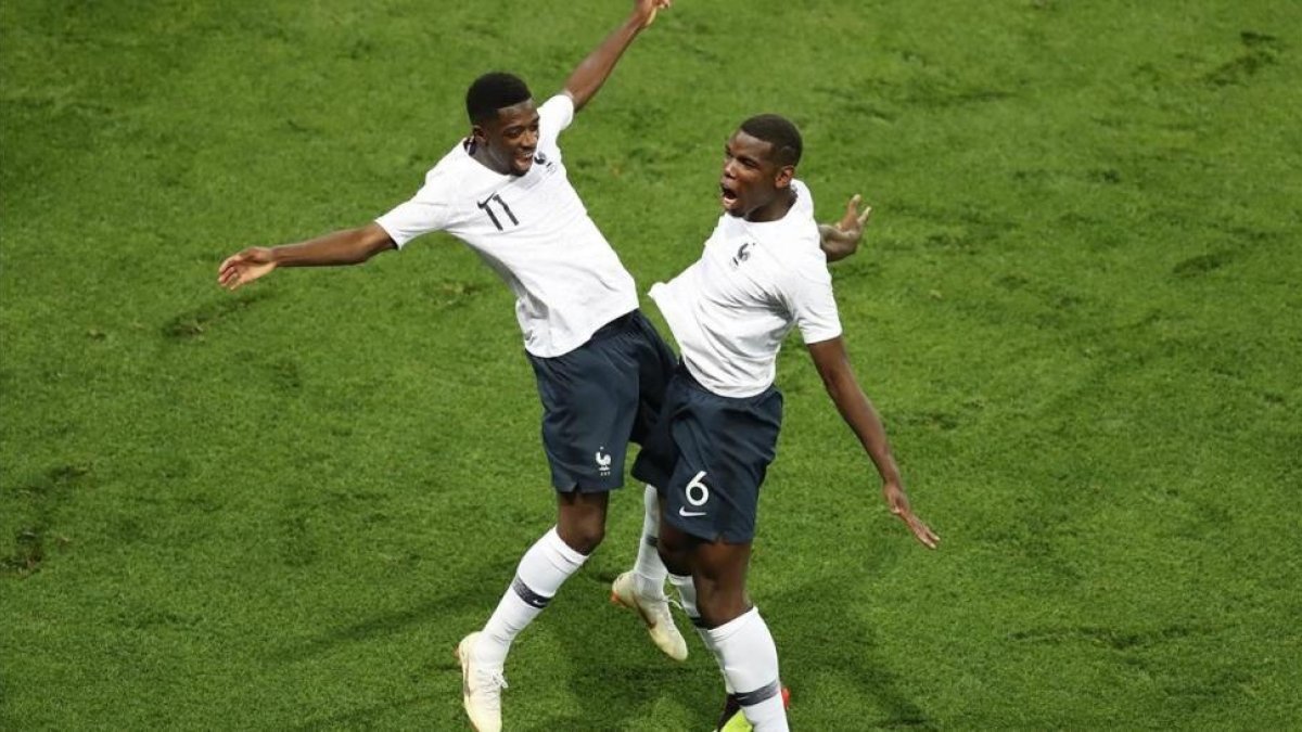 Dembelé celebra con Pogba-AFP / VALERY HACHE