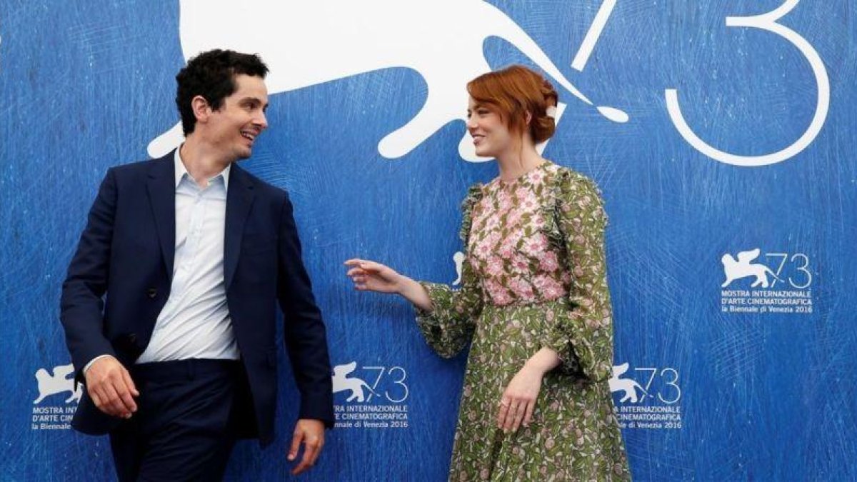 Damien Chazelle y Emma Stone, en la presentación de 'La La Land' en Venecia.-REUTERS / ALESSANDRO BIANCHI