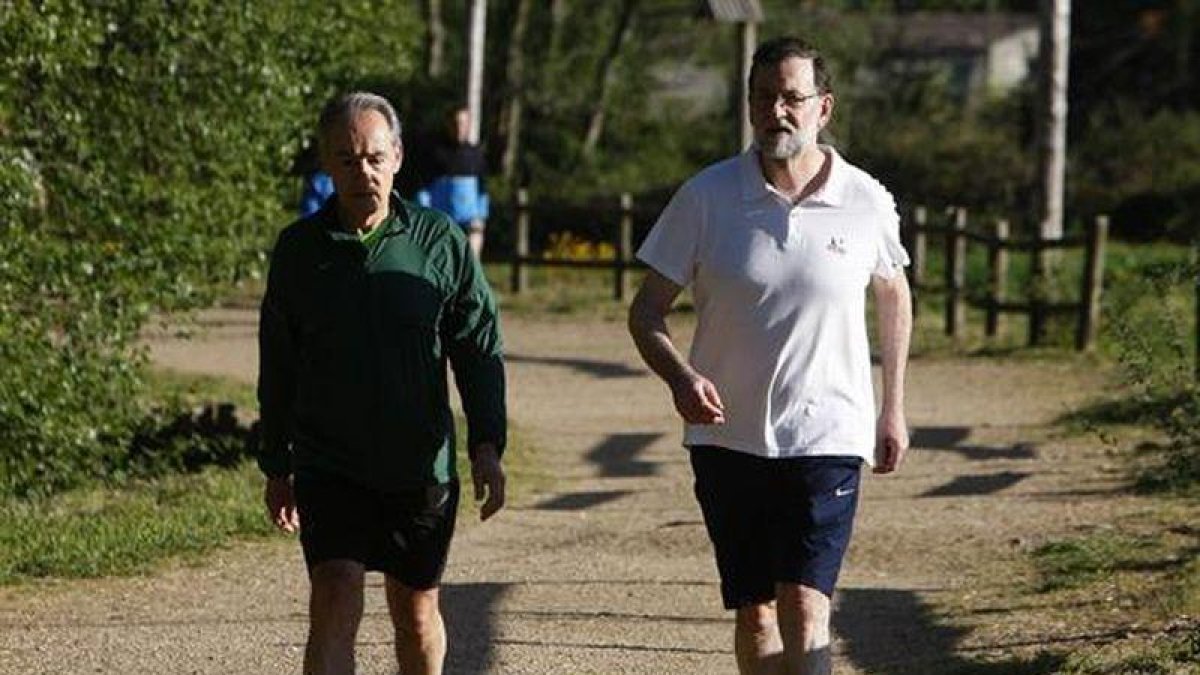 El presidente ha hecho deporte por la Ruta da Pedra e da Auga.-EFE