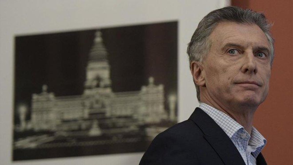 El presidente argentino, Mauricio Macri, antes de dar una rueda de prensa en la Casa Rosada, este lunes.-JUAN MABROMATA (AFP)