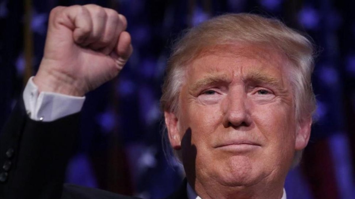 Donald Trump en la noche electoral.-REUTERS / CARLO ALLEGRI/REUTERS