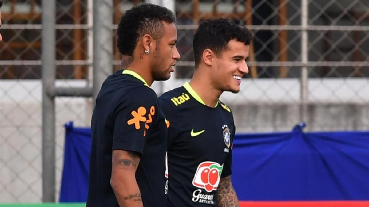 Neymar y Coutinho, en el entrenamiento de la selección brasileña en Porto Alegre.-AFP / NELSON ALMEIDA