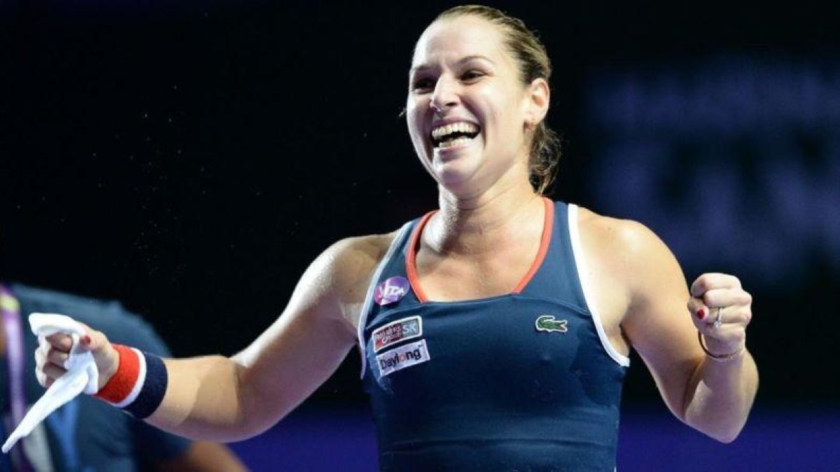 Cibulkova celebra efusivamente su victoria sobre Kuznetsova.-AFP / ROSLAN RAHMAN