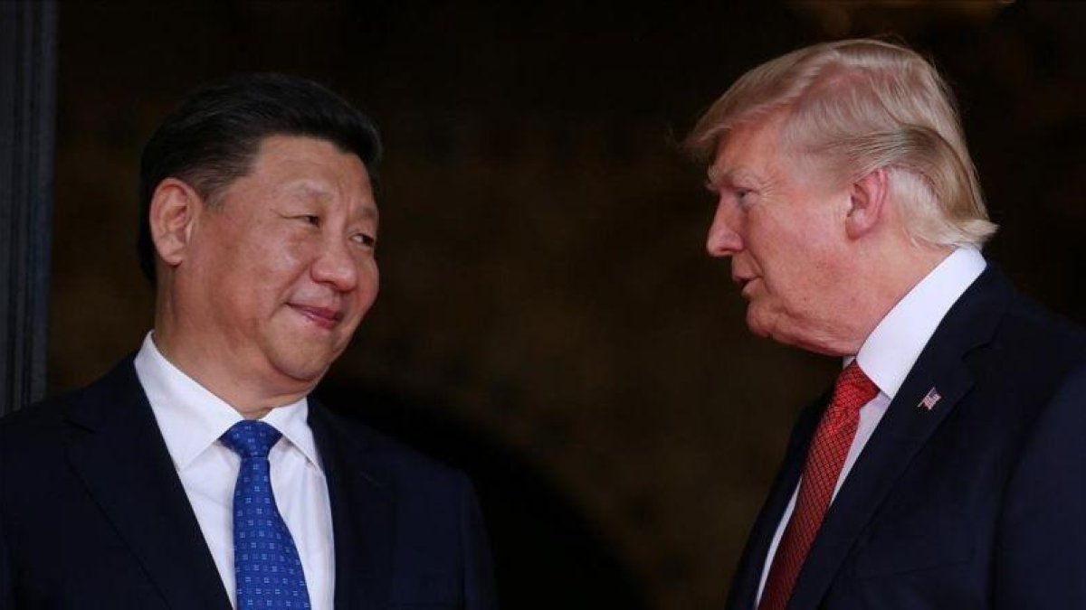 El presidente de EEUU, Donald Trump, recibe al presidente chino, Xi Jinping, el pasado 6 de abril.-REUTERS / CARLOS BARRIA