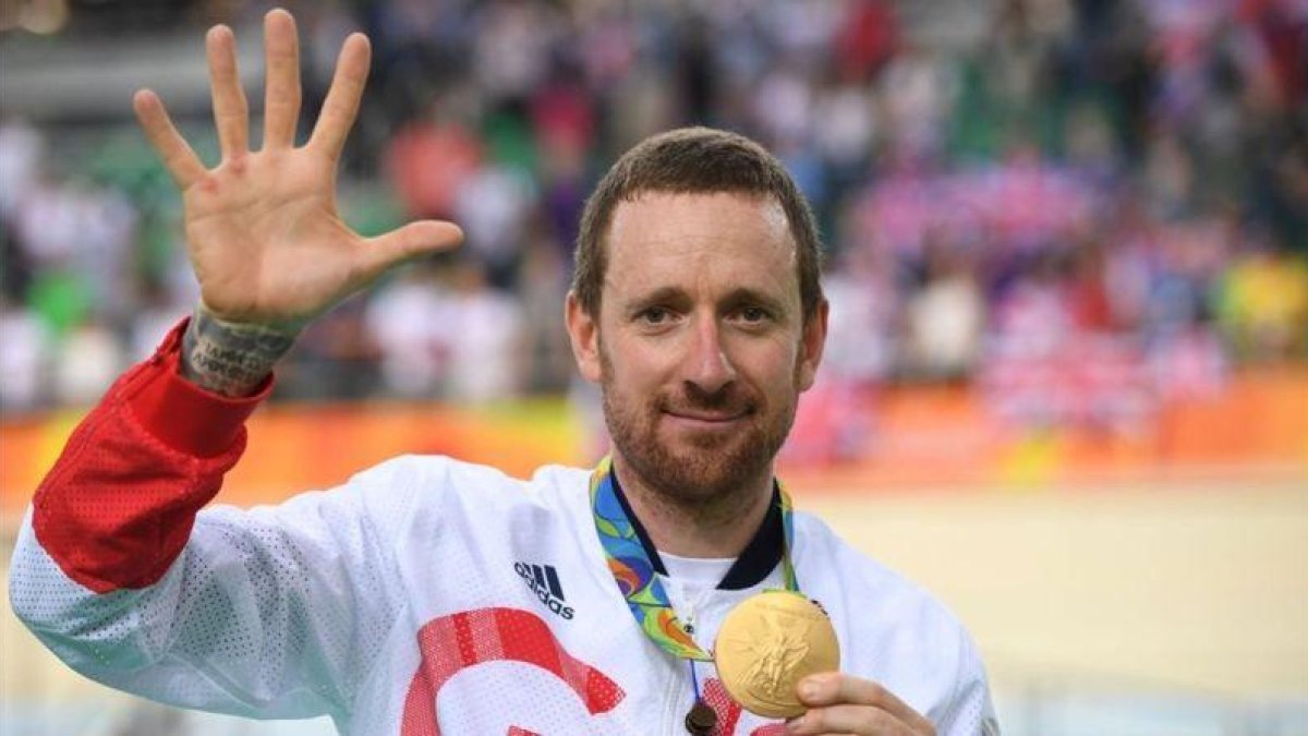 Brad Wiggins, con su medalla olímpica en Río.-AFP / ERIC FEFERBERG