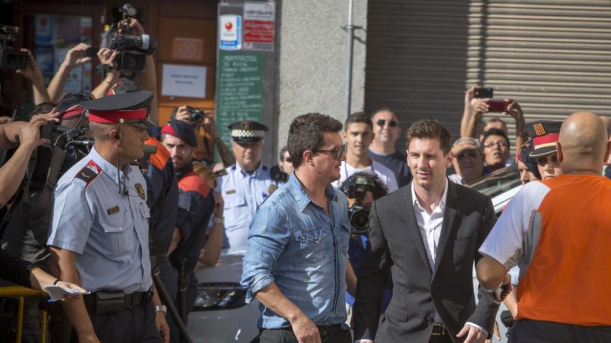 Leo Messi, en septiembre del 2013, a su llegada a los juzgados de Gavà.-JOAN CORTADELLAS