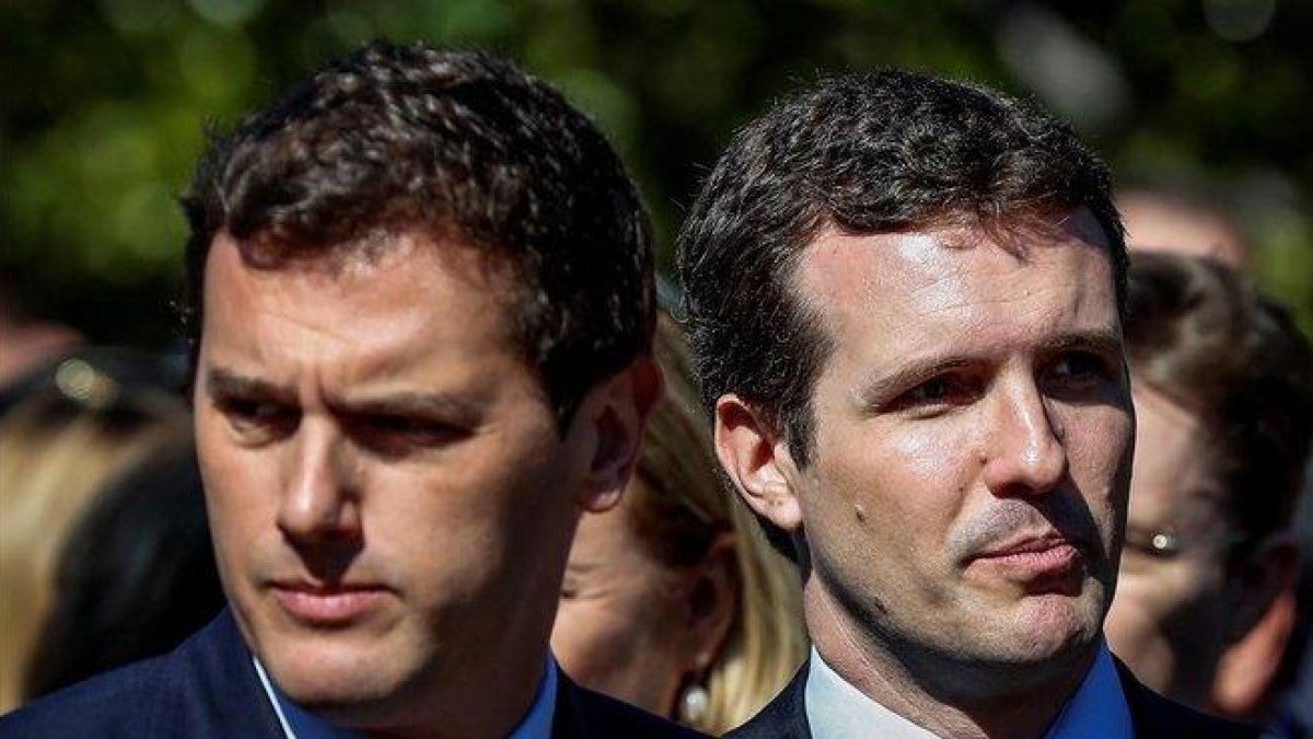 Albert Rivera y Pablo Casado, el pasado 11 de marzo en Madrid, durante el aniversario de la masacre terrorista.-EFE / EMILIO NARANJO