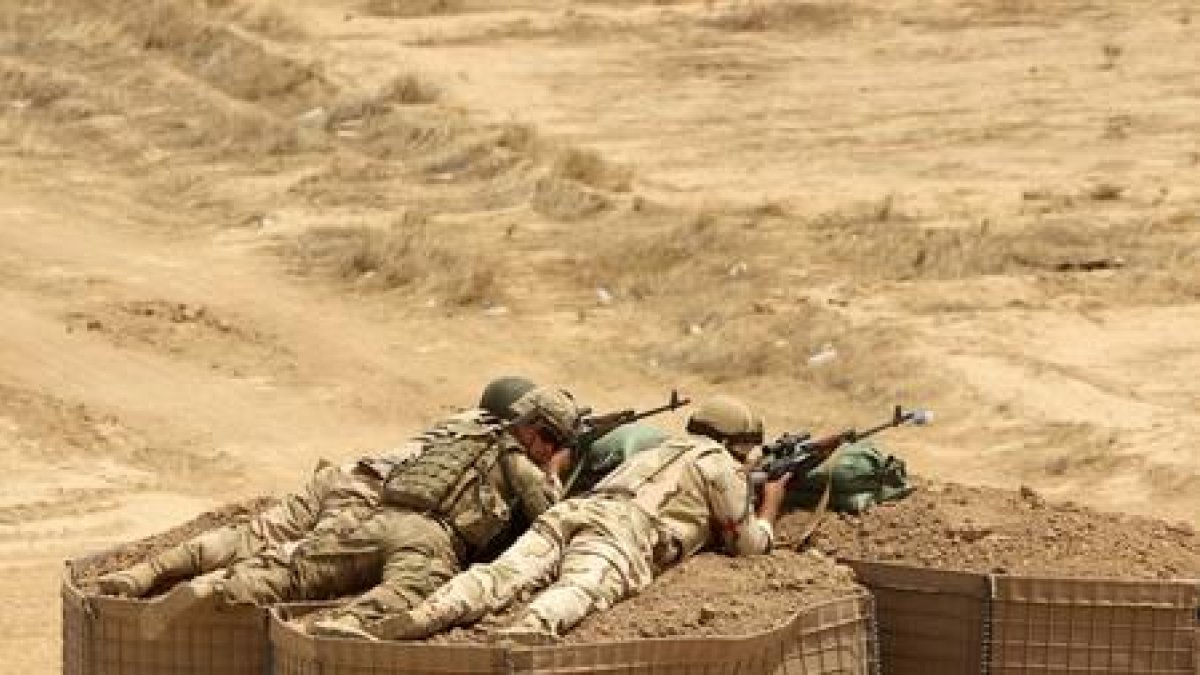 Soldados iraquís participan en maniobras coordinadas por instructores militares españoles.-ALI AL-SAADI (AFP / ALI AL-SAADI)
