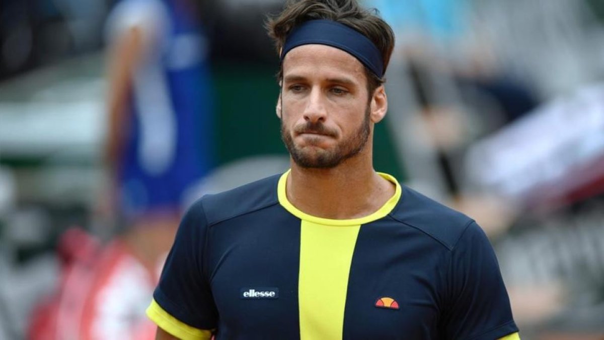 Feliciano López, que forma pareja de dobles con el catalán Marc López.-AFP / MARTIN BUREAU
