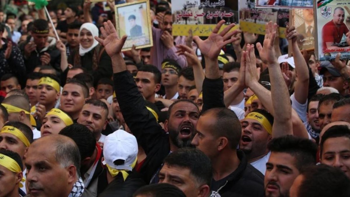 Manifestación de familiares de presos palestinos.-EPA / ALAA BADARNEH