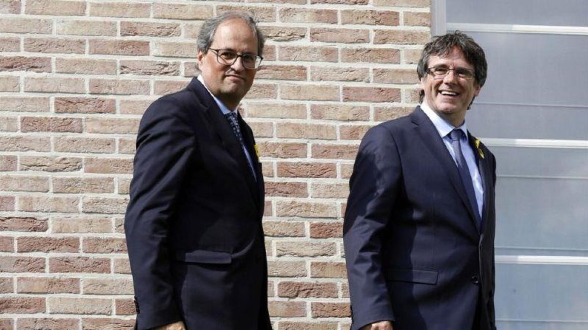Carles Puigdemont y Quim Torra, el pasado 28 de julio.-NICOLAS MAETERLINCK (AFP)
