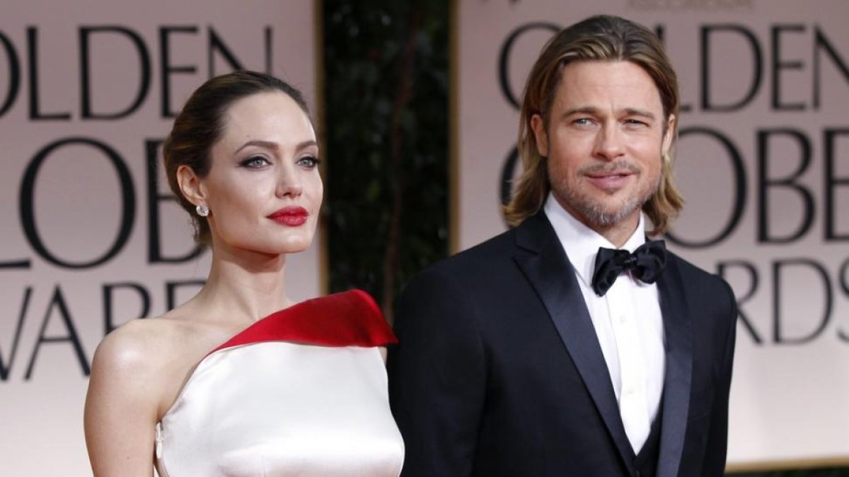 Angelina Jolie y Brad Pitt, en el 2013.-MARIO ANZUONI / REUTERS