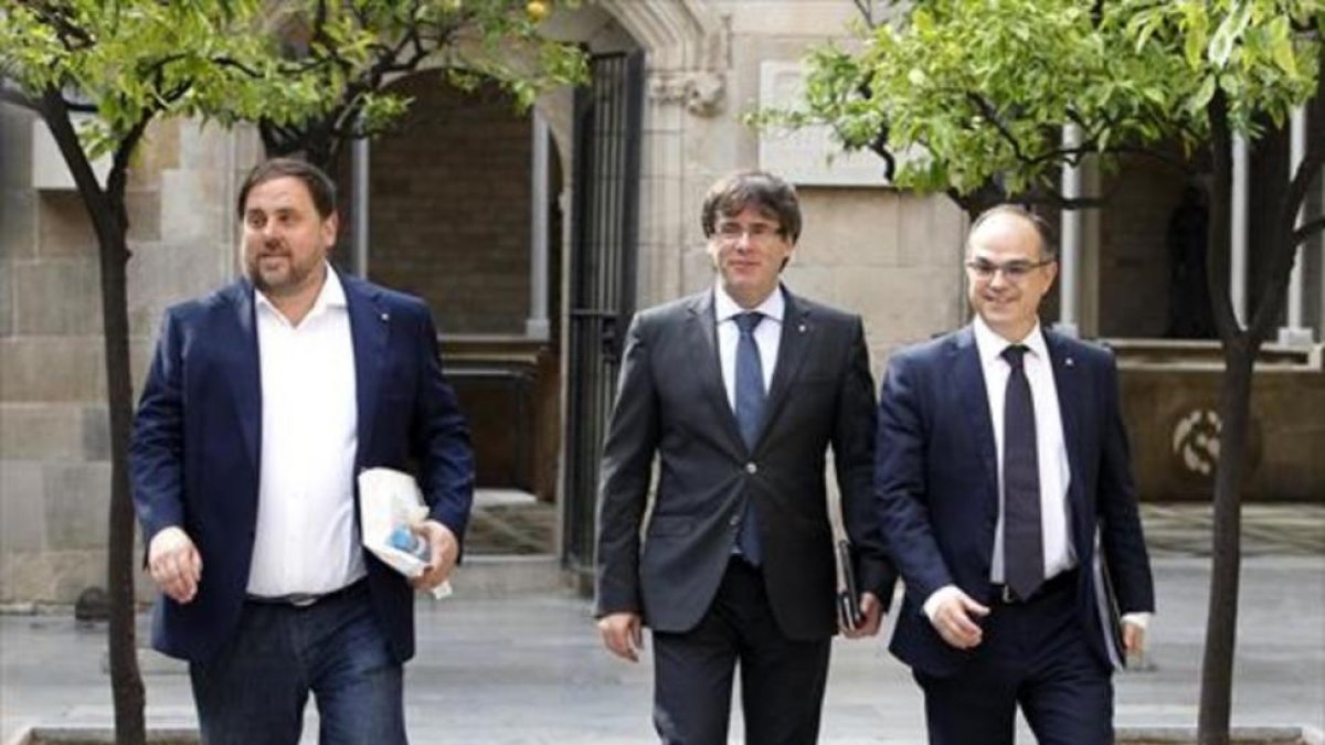 Junqueras, Puigdemont y Turull, el 1 de agosto-RICARD CUGAT