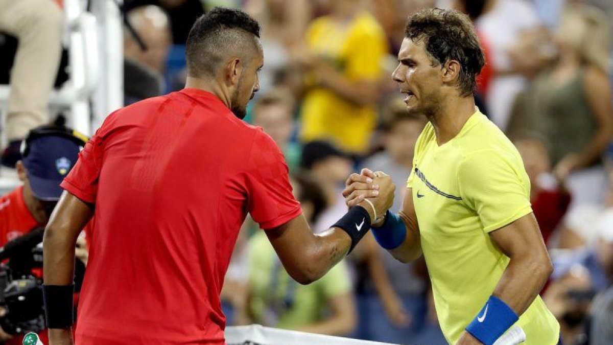 Rafa Nadal felicita a Nick Kyrgios, al final del partido.-MATTHEW STOCKMAN (AFP)