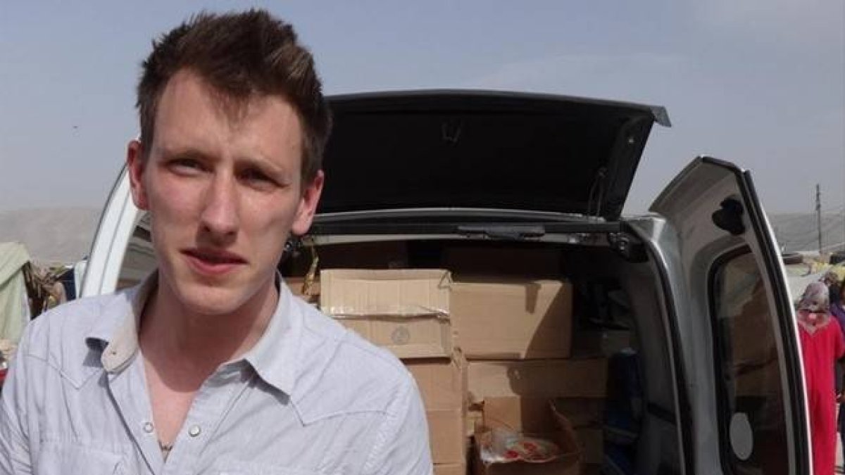 Peter Kassig durante un envío de ayuda huamnitaria a Siria.-