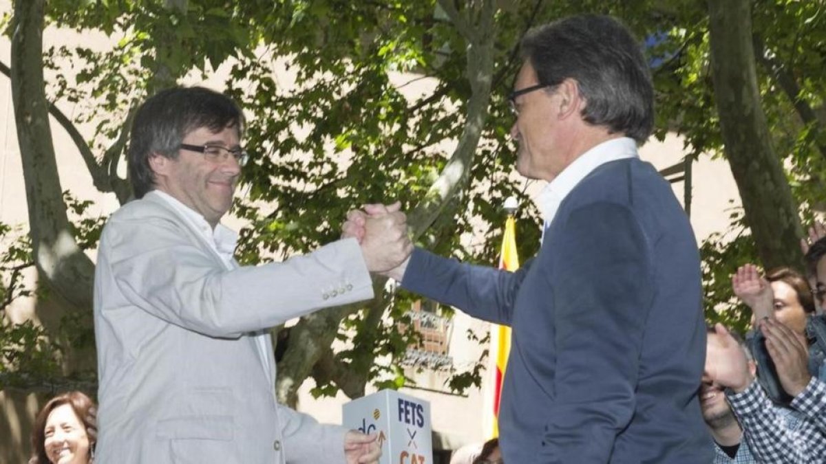 Artur Mas y Carles Puigdemont, en un acto de campaña reciente.-JOSEP GARCÍA