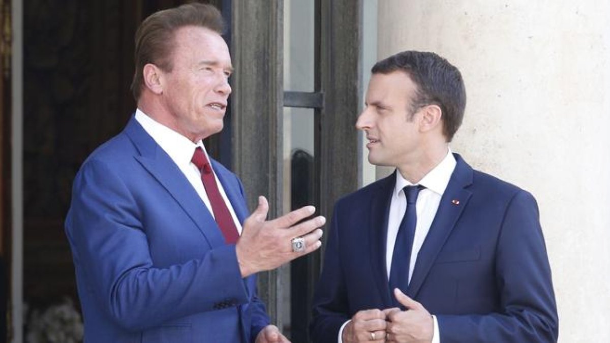Macron y Schwarzenegger juntos en el Elíseo.-ATLAS
