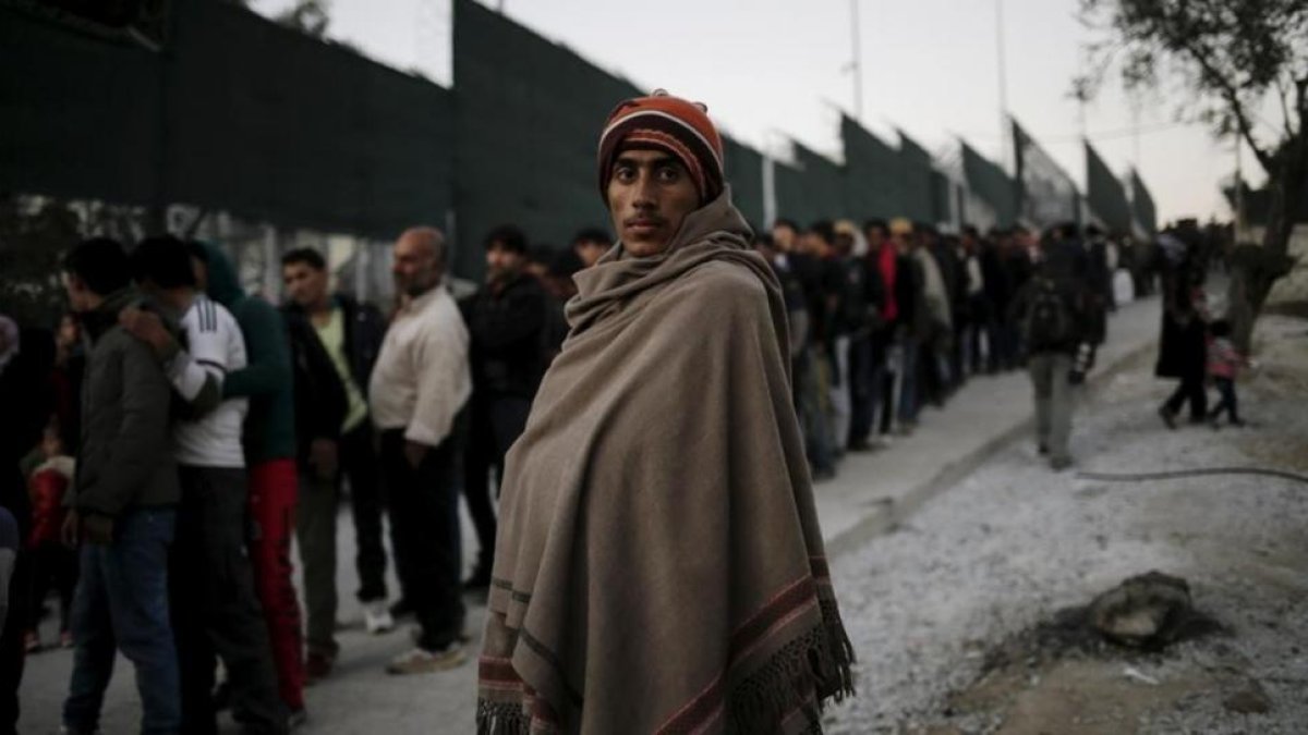 Refugiados en el campamento de Moria, en Grecia.-REUTERS