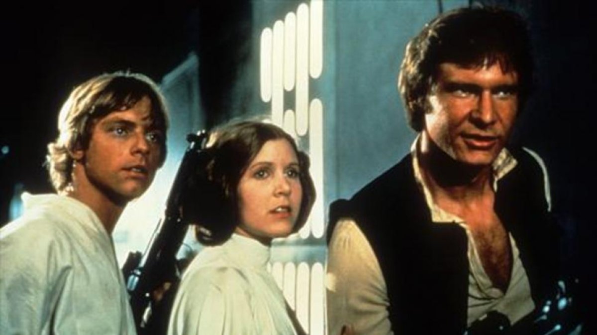 Los actores Mark Hamill, Carrie Fisher y Harrison Ford como Luke Skywalker, princesa Leia y Han Solo.-ARCHIVO