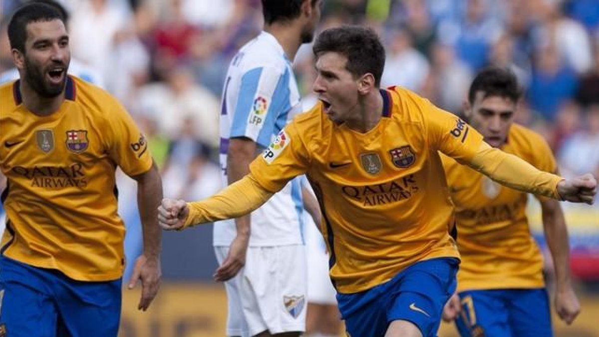 Messi celebra el gol en La Rosaleda.-AFP / JORGE GUERRERO