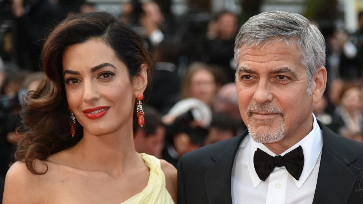 El matrimonio George Clooney y Amal Alamuddin, en el Festival de Cannes del 2016.-AFP / ALBERTO PIZZOLI