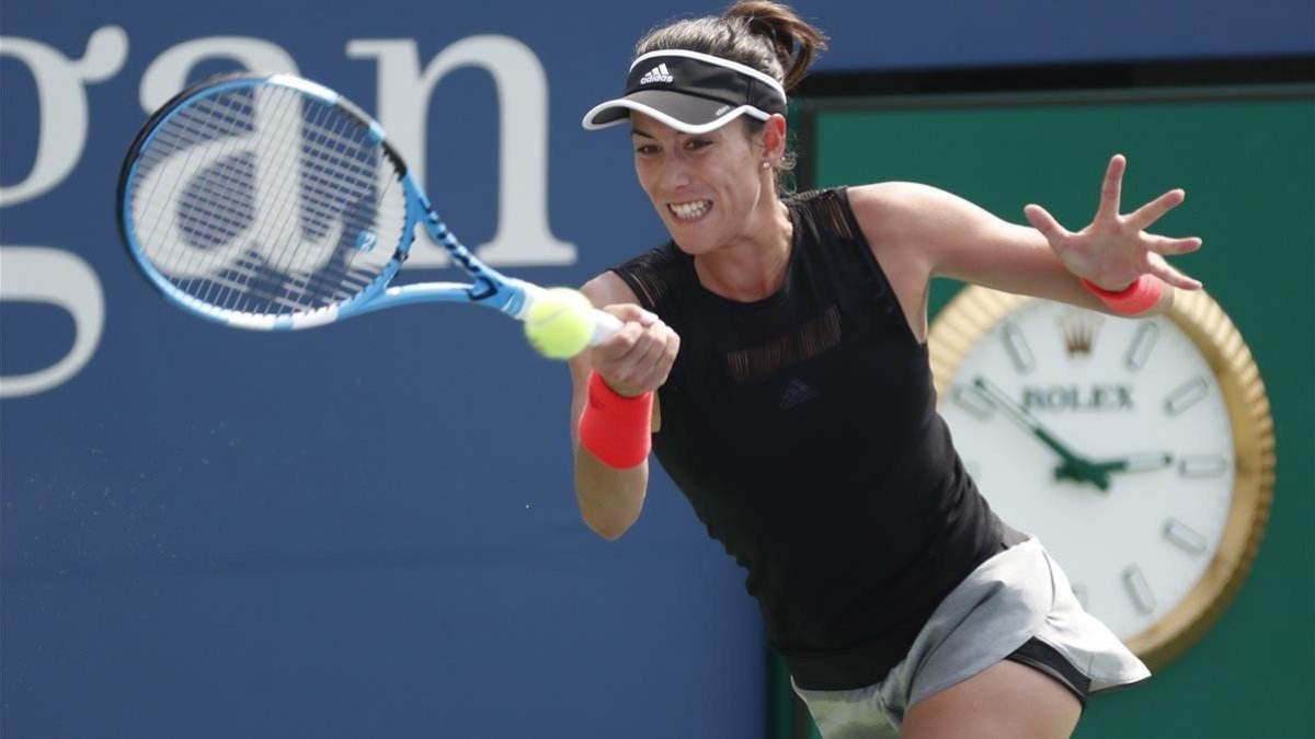 Muguruza, en su partido ante Zhang. /-JERRY LAI