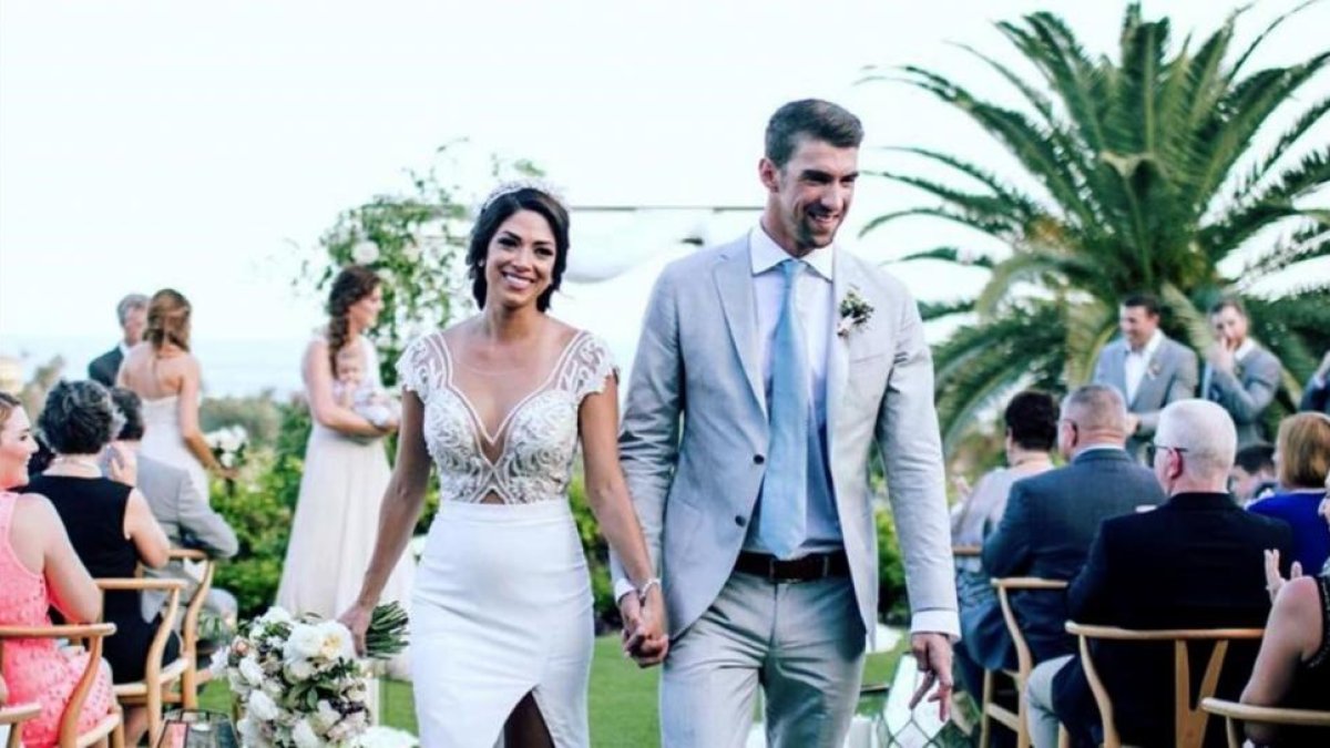 El nadador estadounidense Michael Phelps y su esposa Nicole Johnsonhan, el día de su boda.-INSTAGRAM