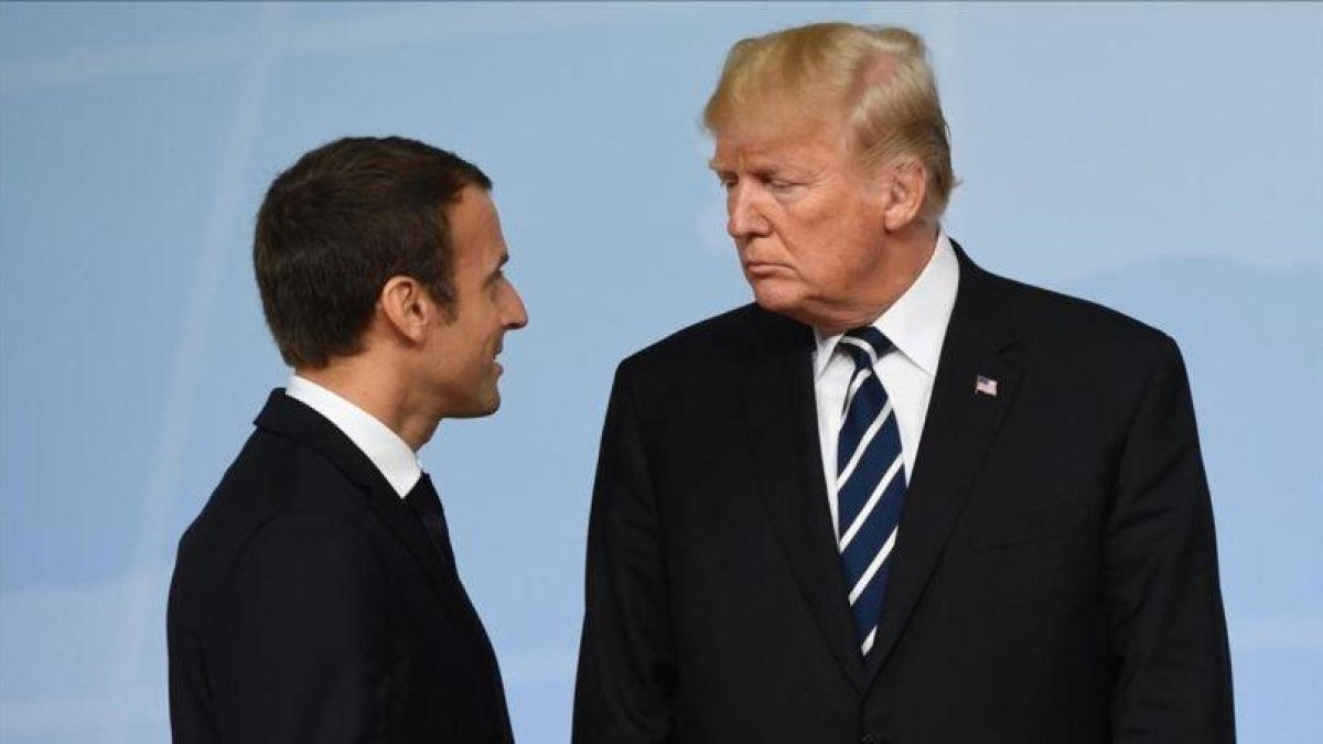 Donald Trump y Emnauel Macron durante las rueniones del G20 de la pasada semana en Hamburgo.-SAUL LOEB
