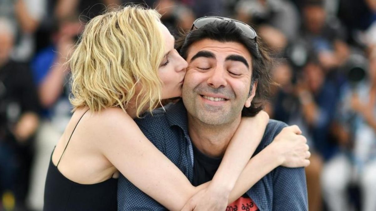 Diane Kruger y Fatih Akin, en la presentación de 'In the fade' en Cannes.-AFP / ALBERTO PIZZOLI