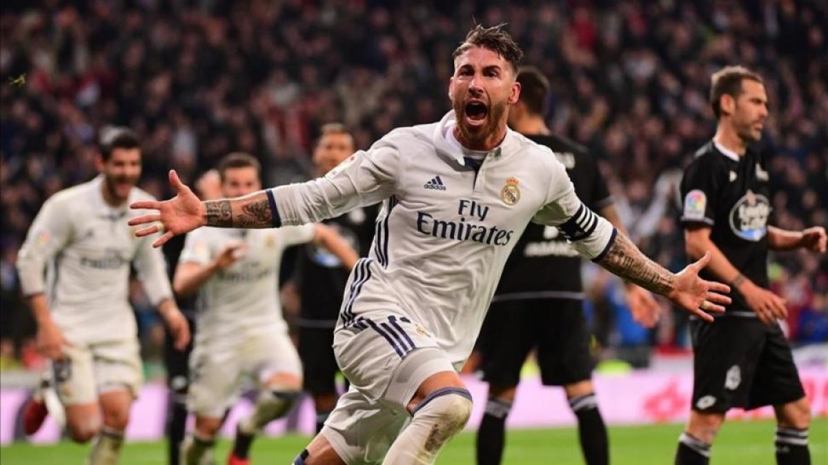 Ramos celebra su gol al Deportivo en el tiempo añadido, el pasado 10 de diciembre.-AFP / PIERRE-PHILIPPE MARCOU