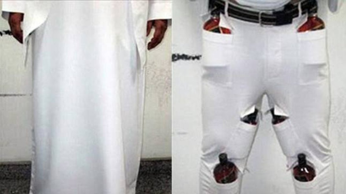 Imágenes cedidas por los servicios de aduanas de Bahréin en las que se muestra cómo el sujeto escondió las 12 botellas de licor que intentaba pasar a Arabia Saudí.-