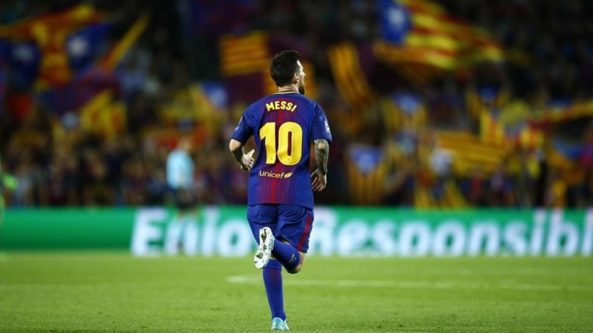 Messi celebra su segundo gol a la Juventus en el Camp Nou.-AP / MANU FERNÁNDEZ