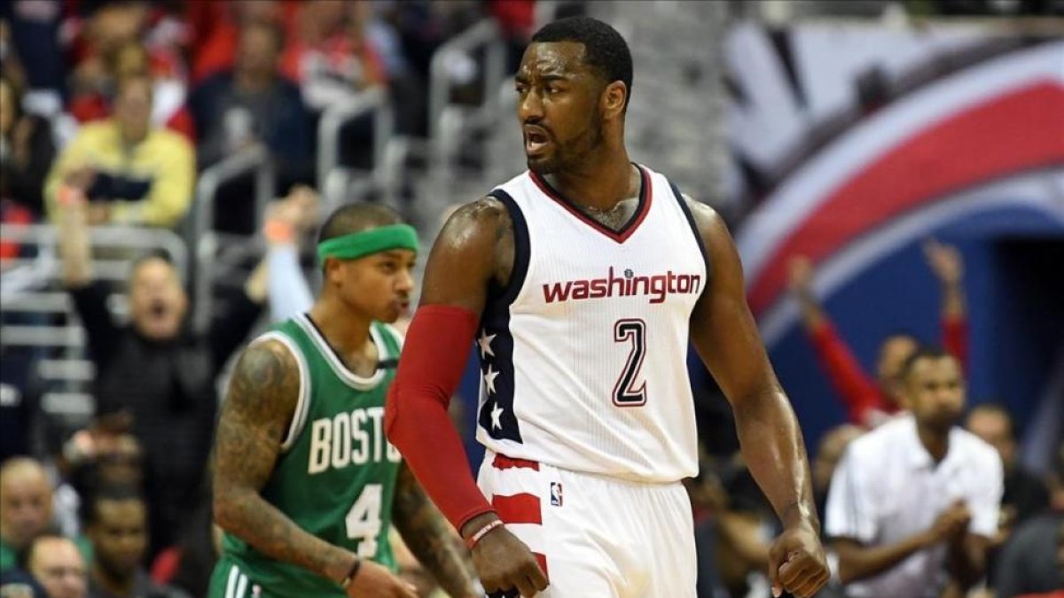 John Wall (Washington) celebra una canasta en el tercer cuarto.-AFP