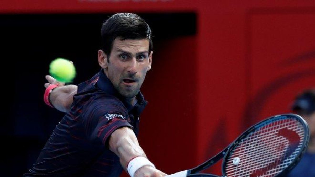 Djokovic celebra su victoria.-
