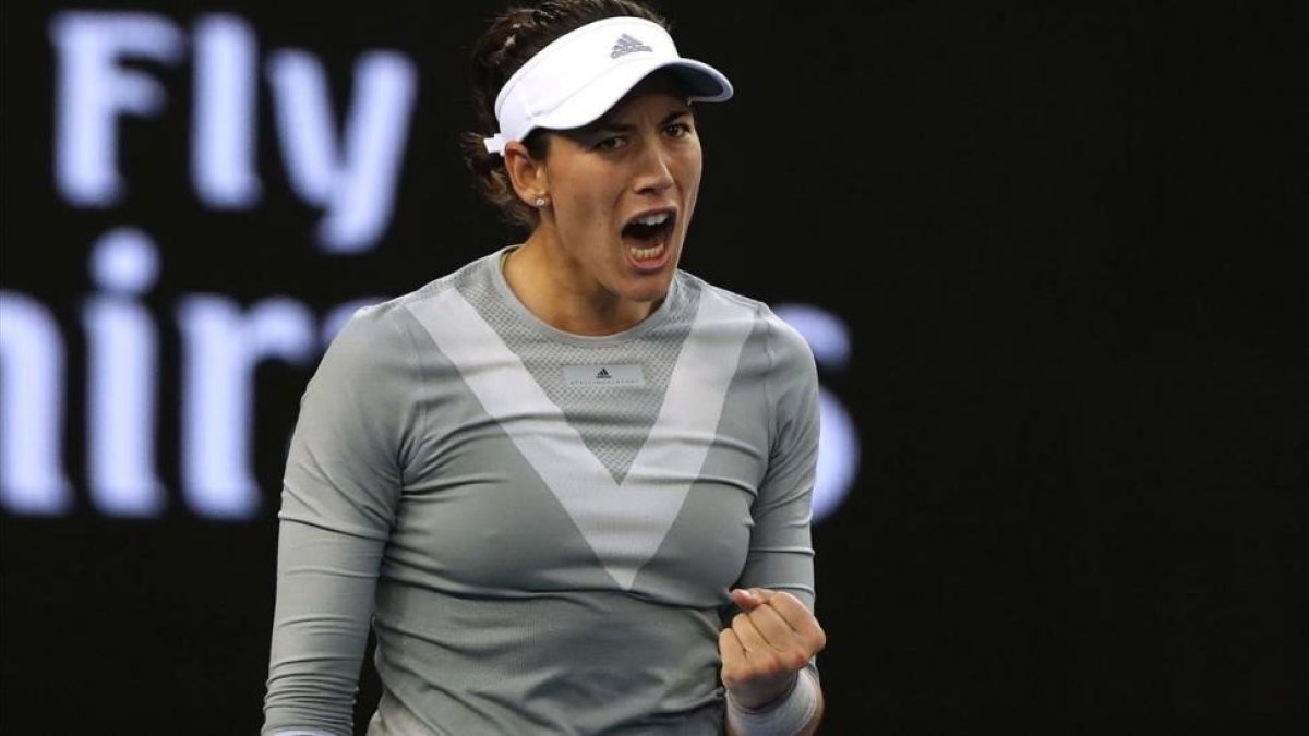 El grito de la victoria de Garbiñe Muguruza tras derrotar a Jessika Ponchet en Australia.-/ REUTERS / ISSEI KATO