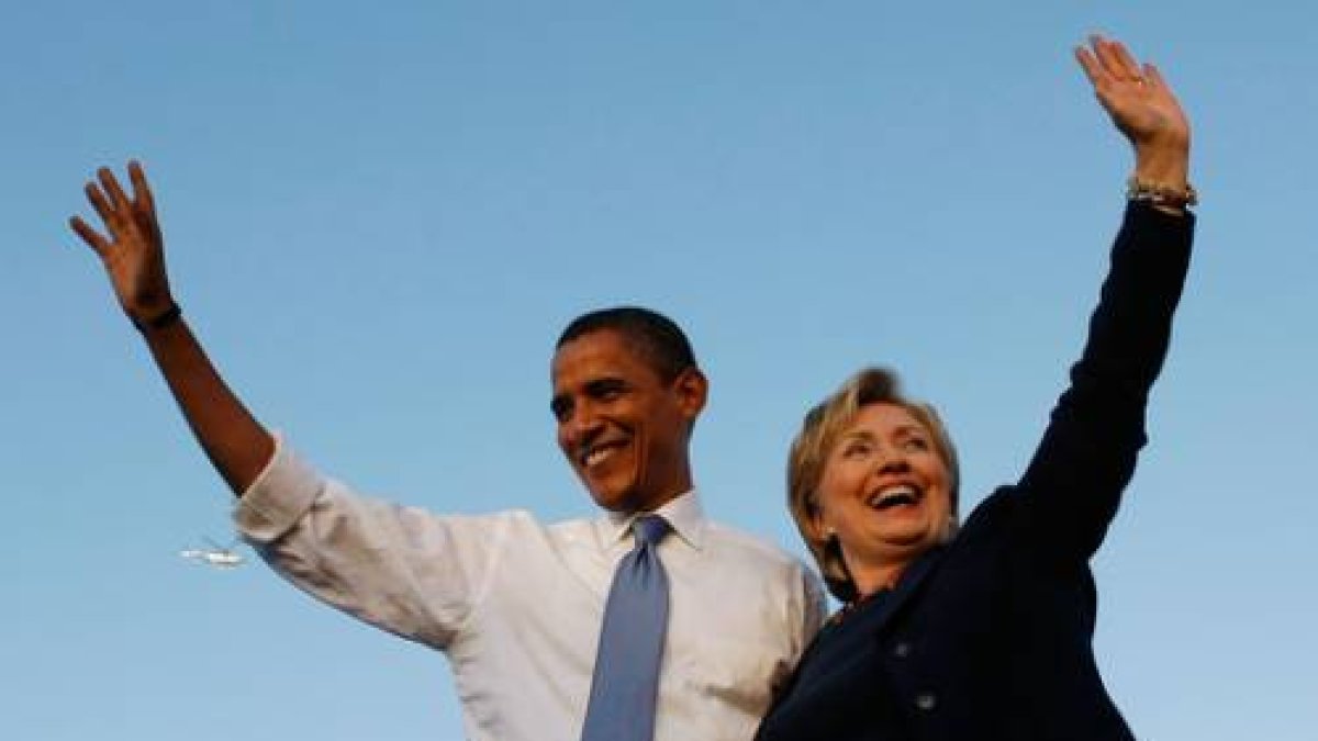 Barack Obama y Hillary Clinton hacen campaña juntos, en octubre del 2008 en Orlando.-Foto: AFP / JOE RAEDLE